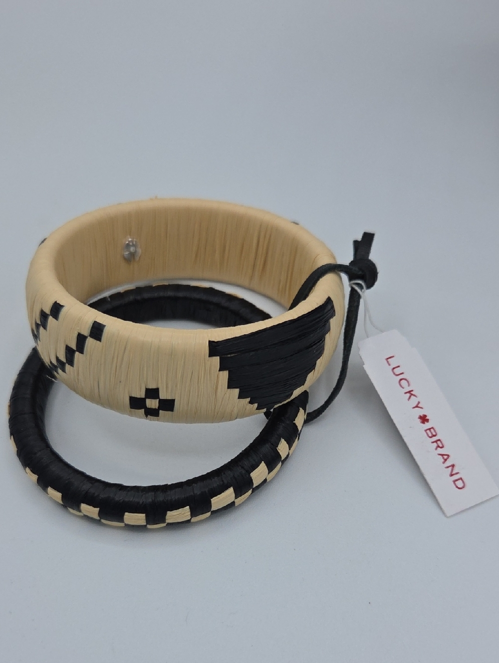 5 for $25! Lucky Brand Black Natural Wrapped Bangle Duo